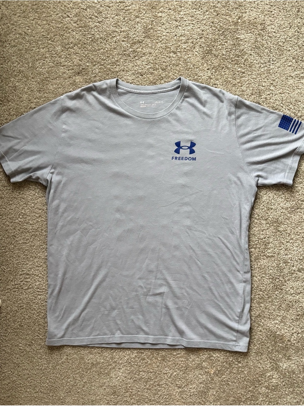 grey and blue under armour tee